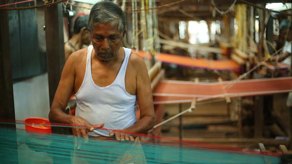 Traditional weaving worker at the Chirakkal Weavers