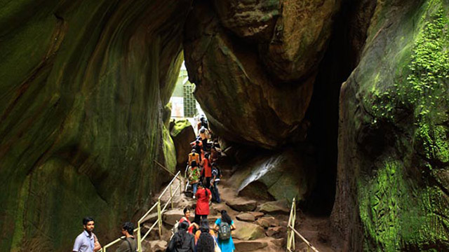 Tourists at Edakkal Cave – the landmark of Wayanad Tourism